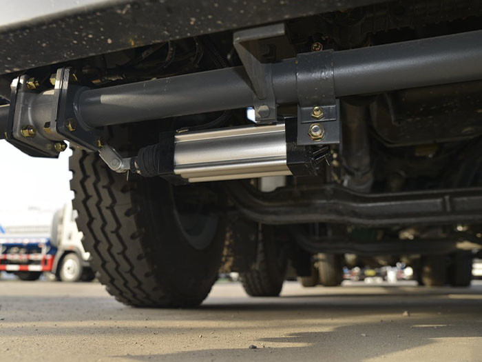 HOWO T7H 440HP 6x4 water tanker truck chassis showing reinforced frame and suspension system