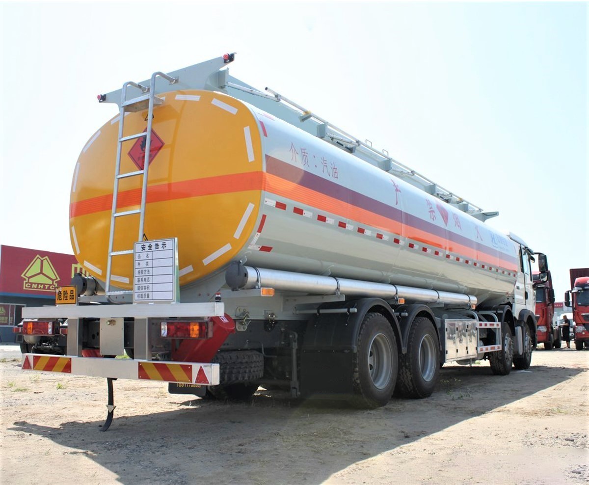 HOWO 340HP 8x4 fuel tanker truck rear three quarter view showing rear valves and heavy duty tank structure