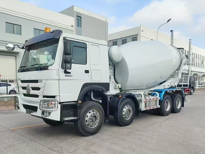Howo 380HP 8x4 concrete mixer truck front three quarter view highlighting chassis and mixing drum