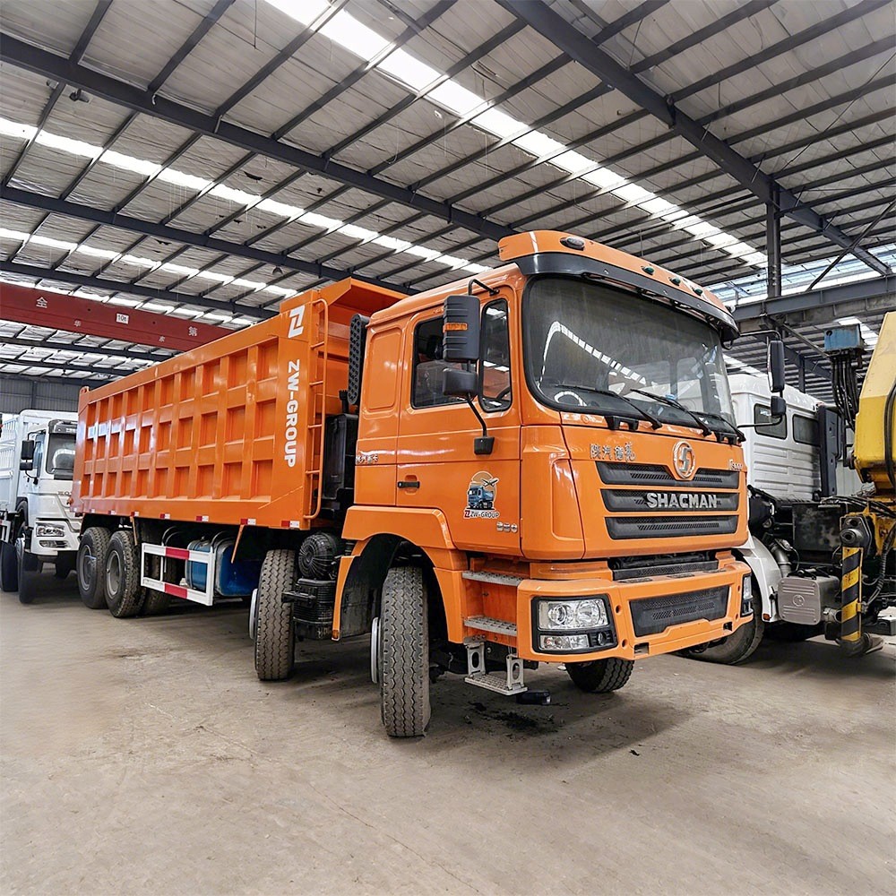 Shacman F3000 380HP 8x4 dump truck front three quarter view highlighting dump body and cab