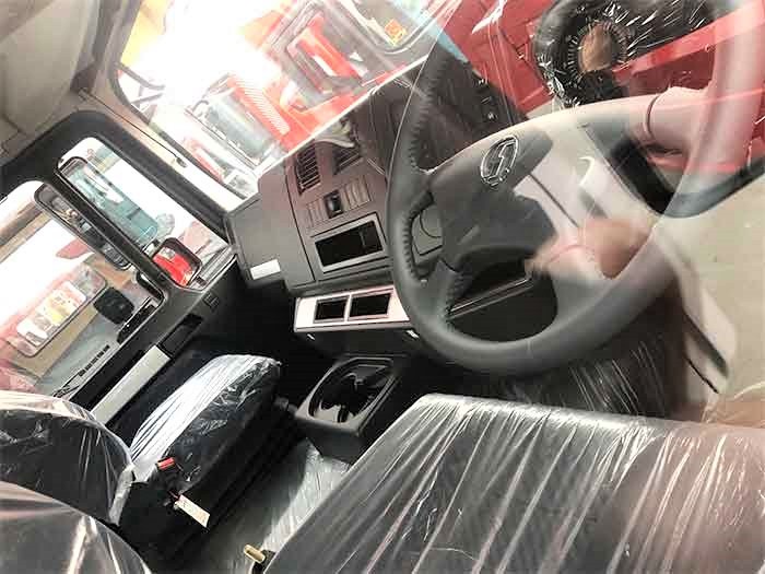 Shacman F3000 6x4 heavy duty tractor truck steering wheel detail with multifunction controls