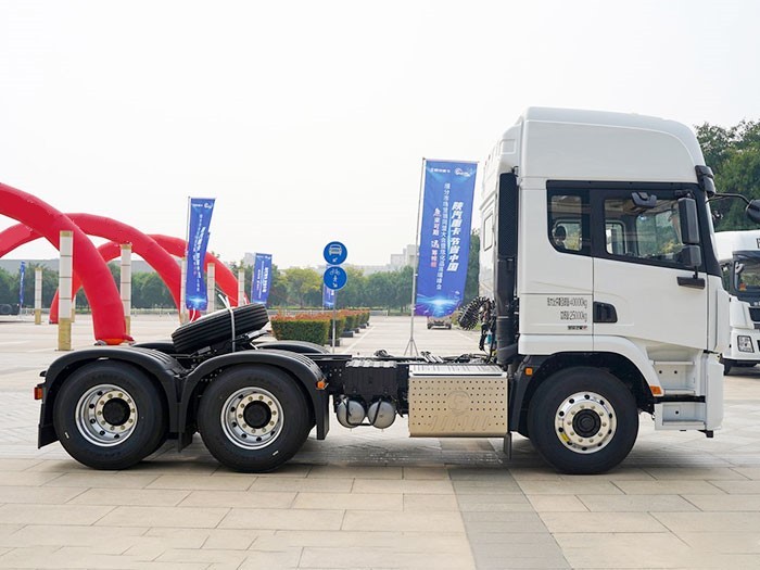 Shacman X5000 6x4 heavy duty tractor truck side view showing dual rear axle configuration