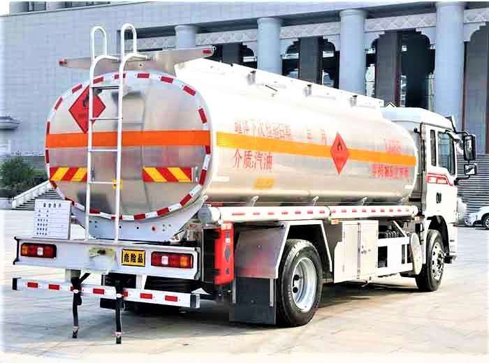 Shacman L3000 4x2 heavy duty fuel tanker truck rear three quarter view showing discharge valve and rear chassis
