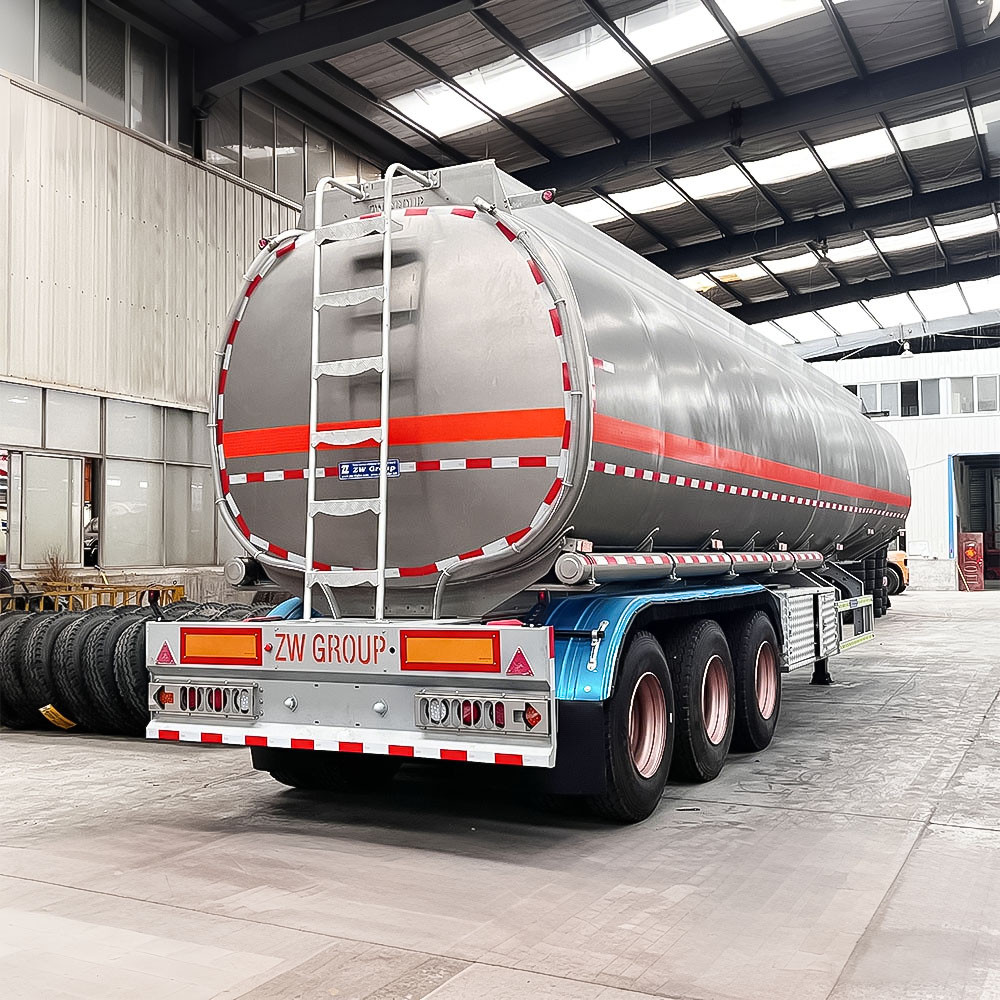 3 axle 42,000L carbon steel fuel tanker semi trailer rear three quarter view showing discharge system and rear platform