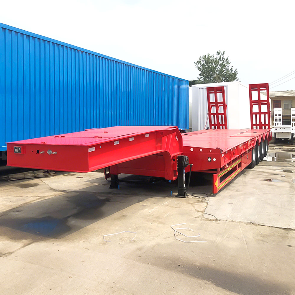 Transporte de maquinaria de 100 toneladas con remolque de plataforma baja