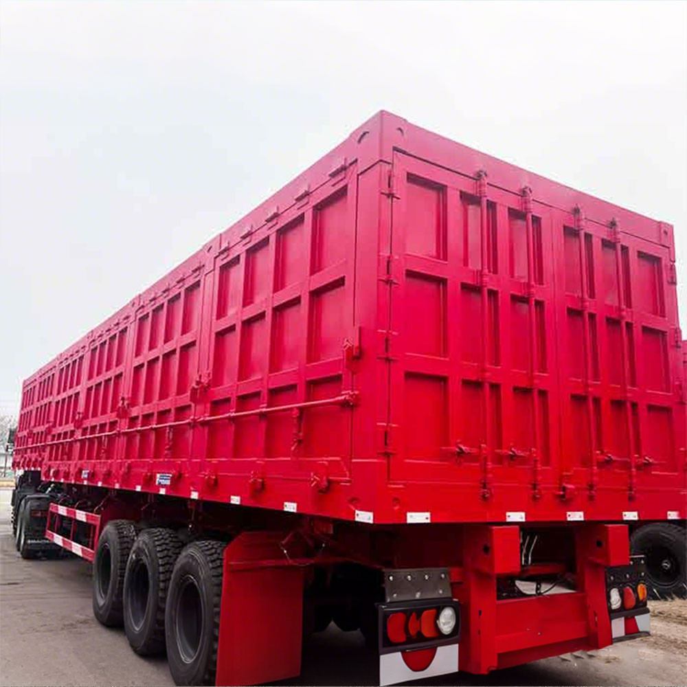 3 axle side tipper semi trailer rear three quarter view showing discharge structure and reinforced frame