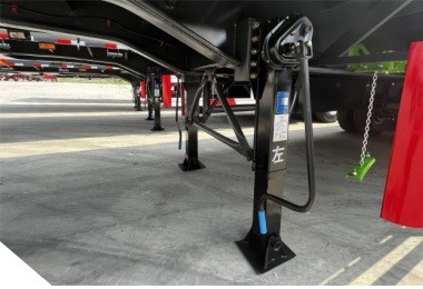 3 axle curtain side semi trailer landing gear detail showing heavy duty support structure