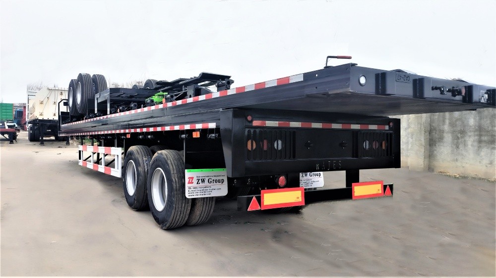 60T superlink flatbed trailer rear three quarter view showing reinforced flatbed and tail structure