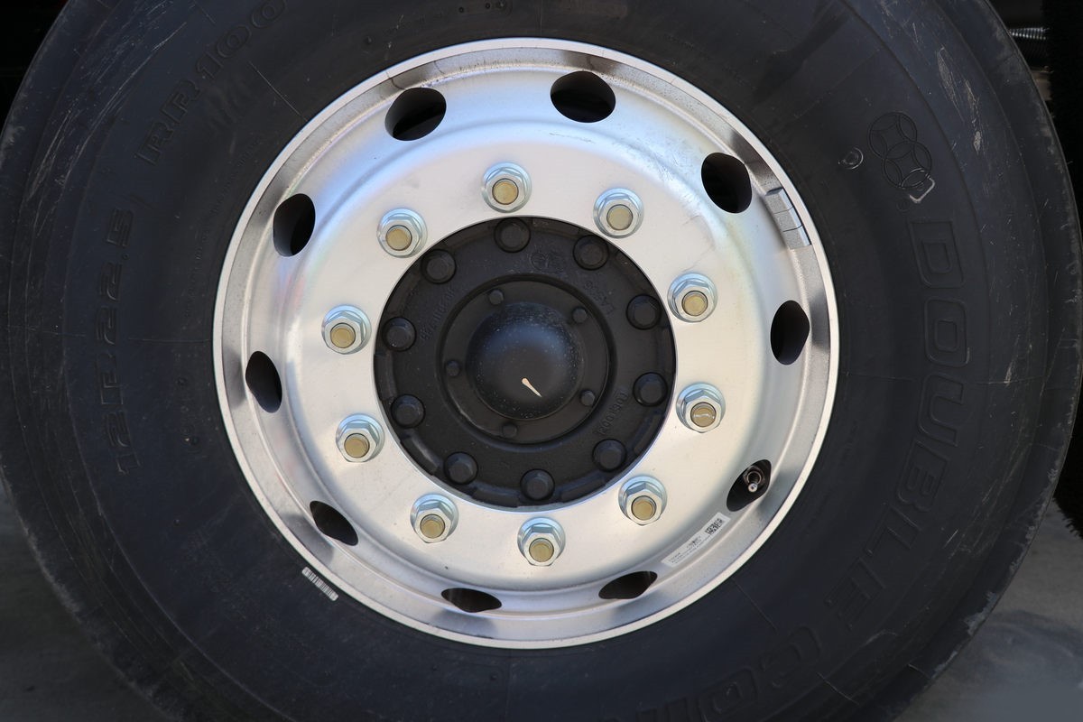 FAW J6P 6×4 tractor truck tire detail showing heavy duty tires for cargo transport