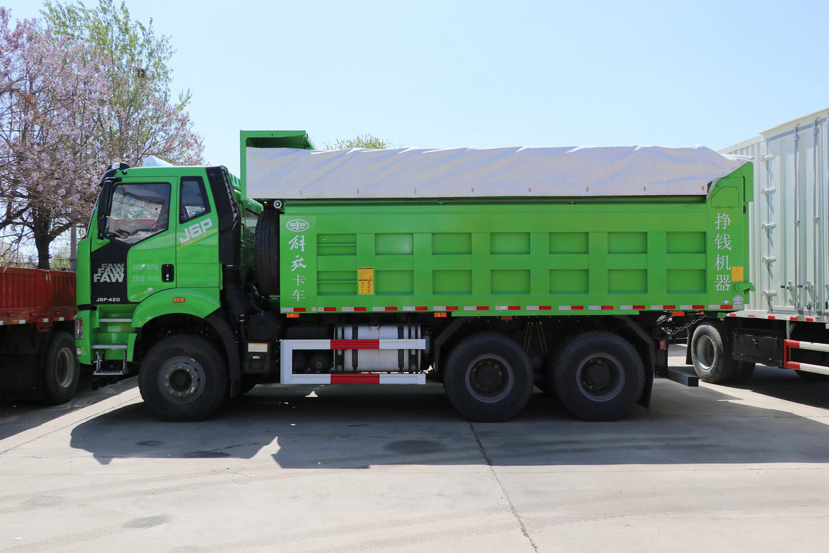 FAW J6P 6×4 dump truck side view showing large capacity dump body and chassis structure