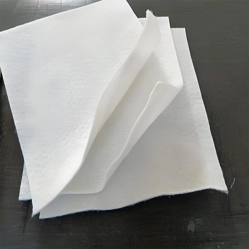 Waterproof composite polyester geotextile