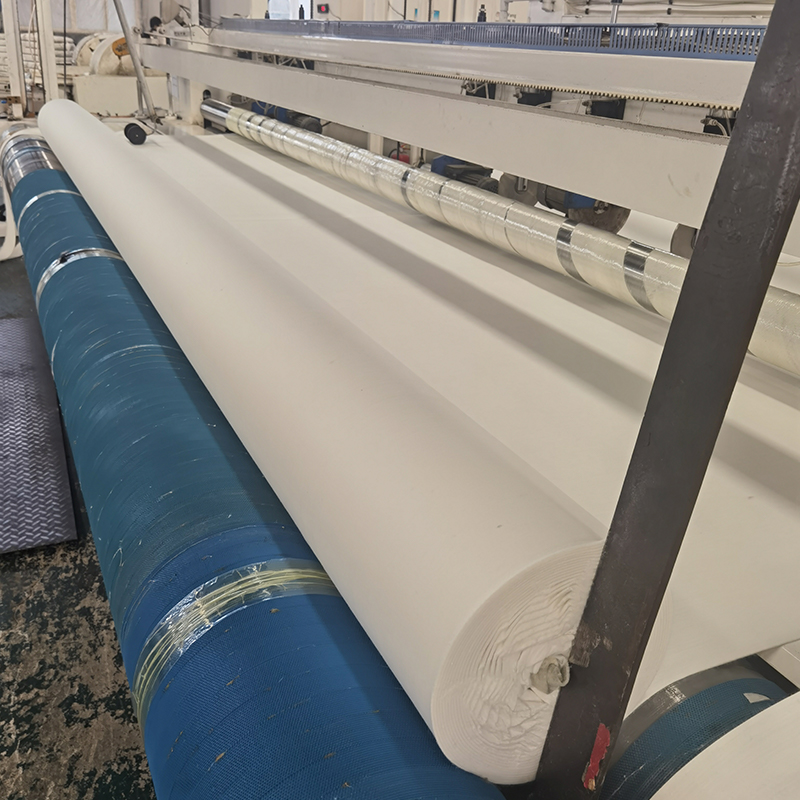 Short-fiber needle-punched nonwoven geotextile