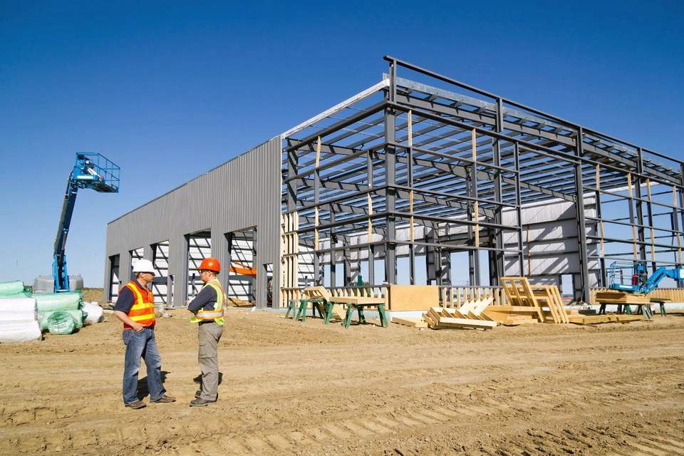 Large Span Heavy Steel Structure Warehouse with windows and Doors and Wall Panels Installed