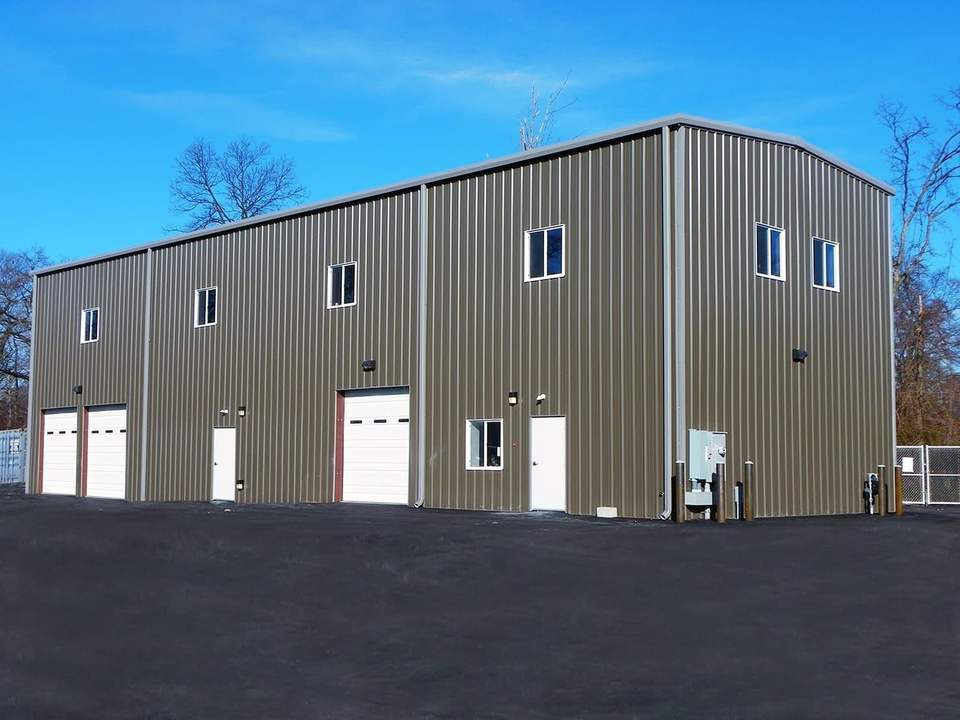 Large Span Heavy Steel Structure Warehouse with windows and Doors and Wall Panels Installed