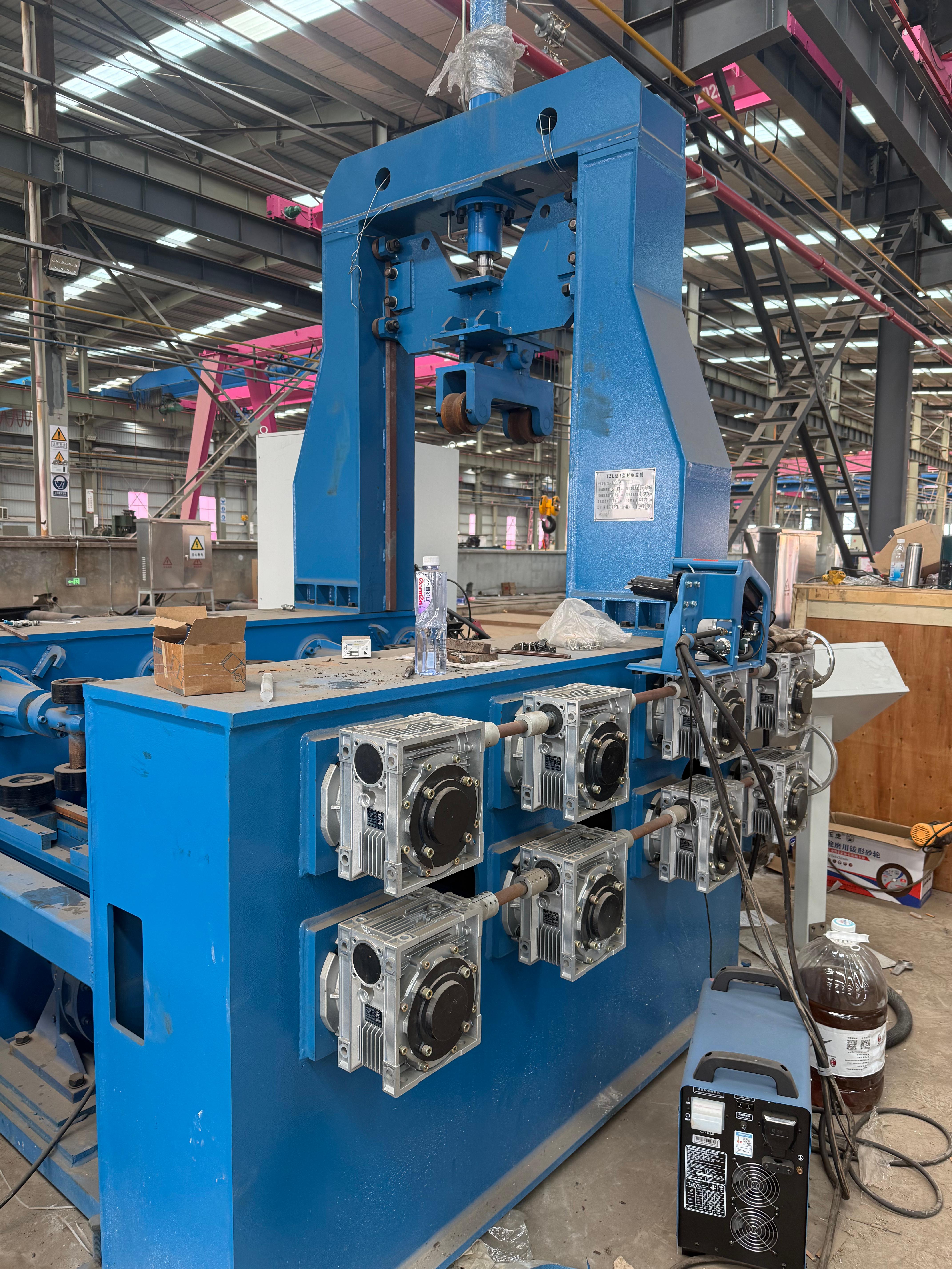 T beam assembly machine