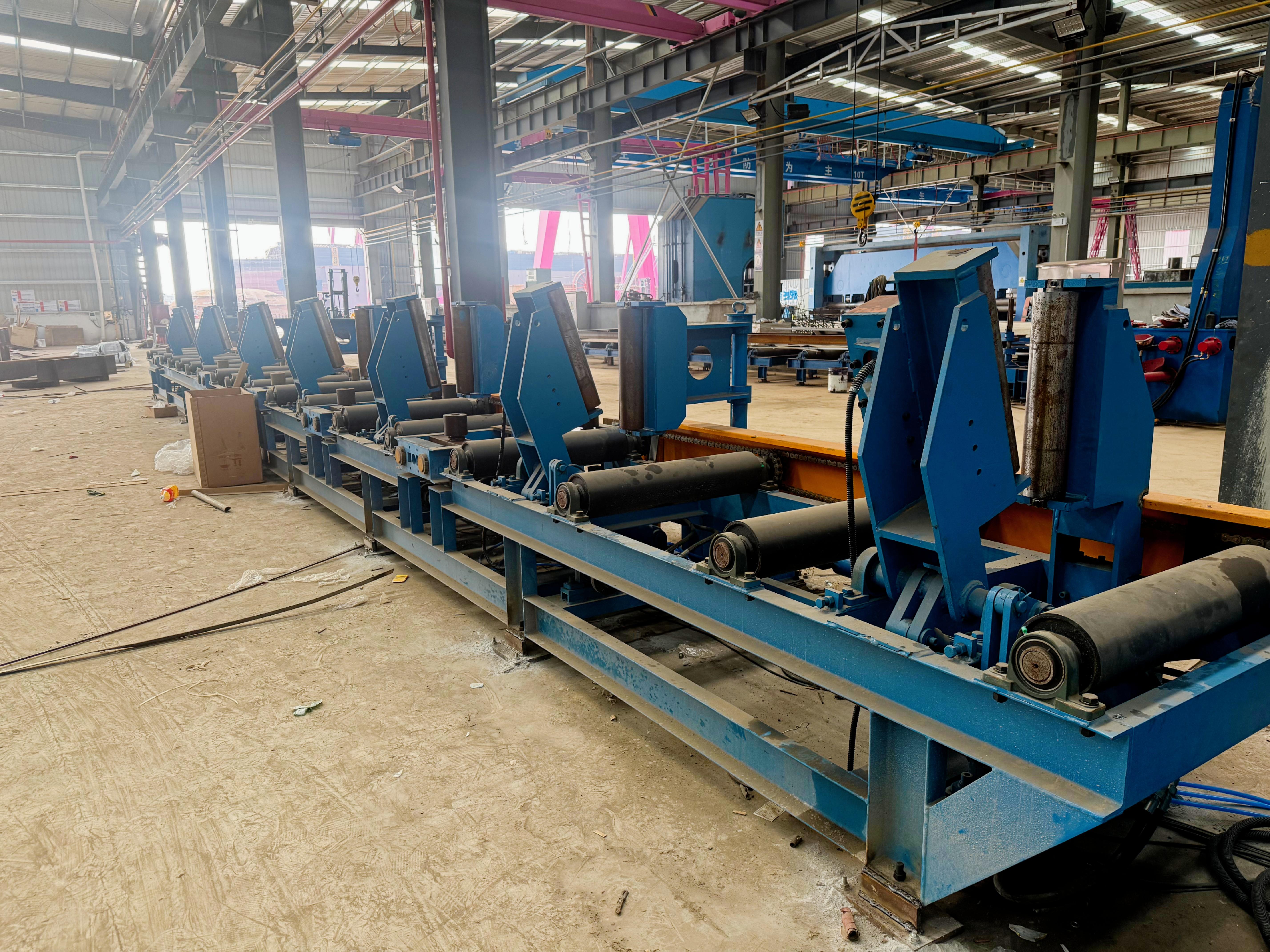 What web and flange sizes can a steel T-beam assembly machine handle?