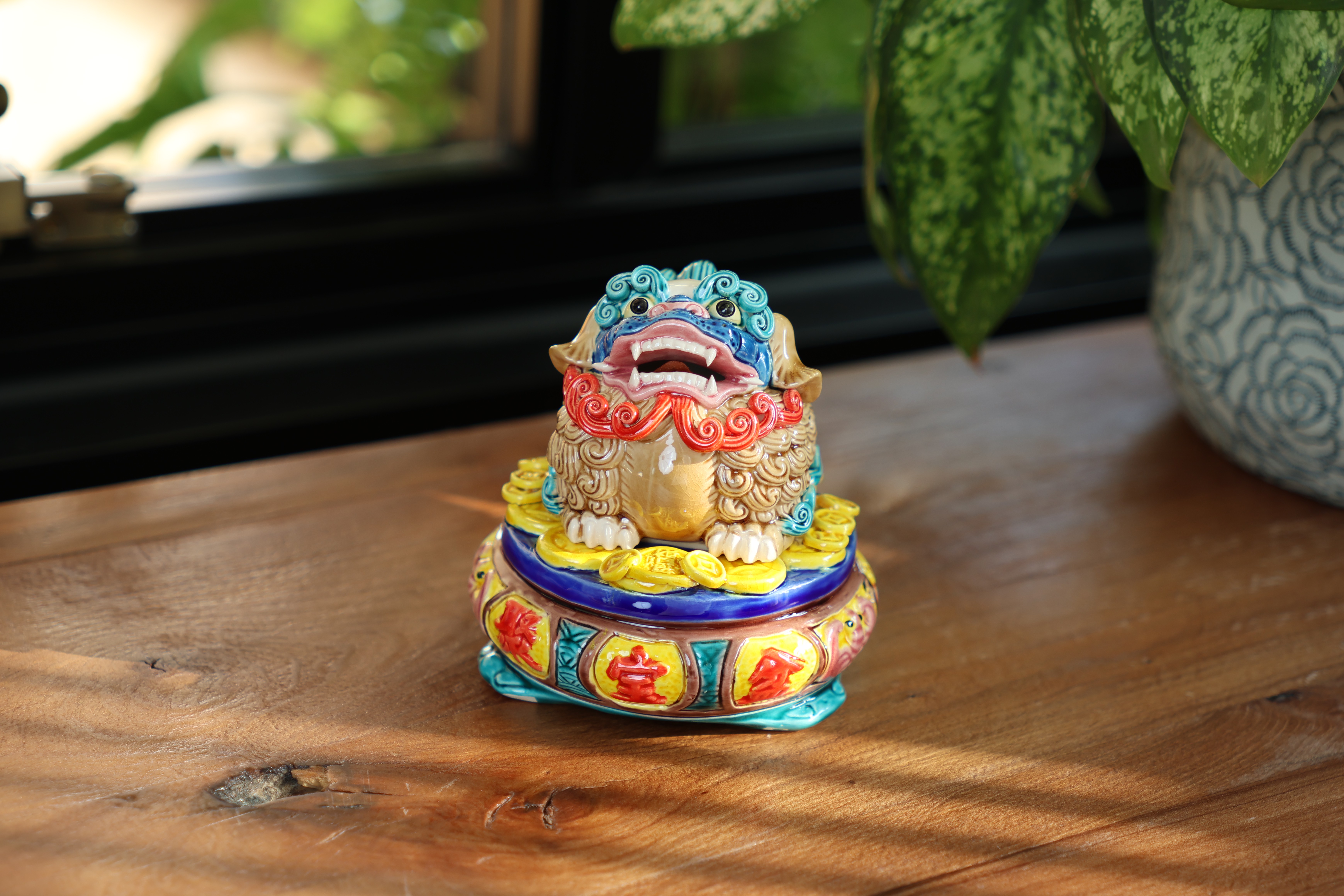 Fortune-Gathering Lion on Wealth Basin