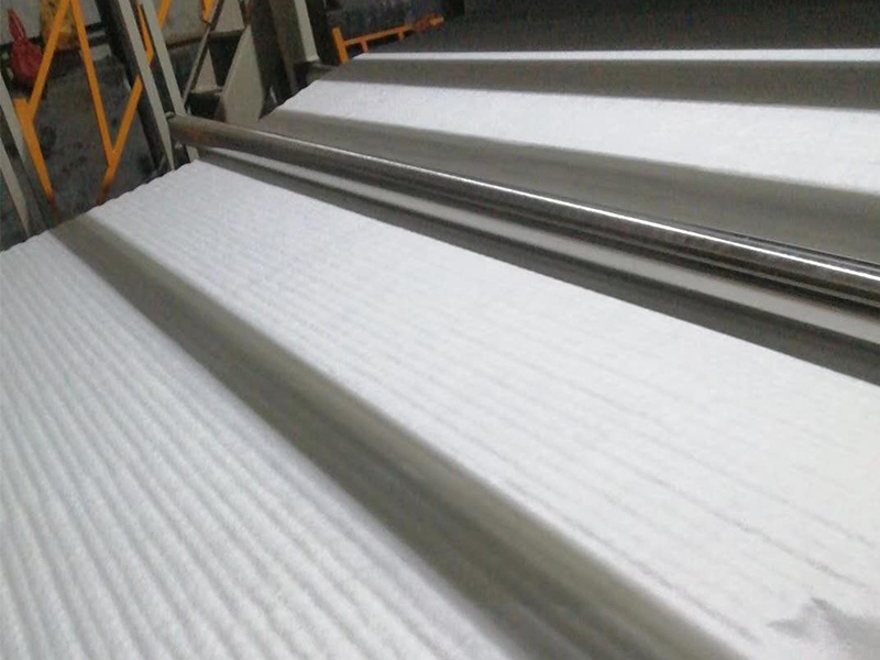 Plastic composite drainage board