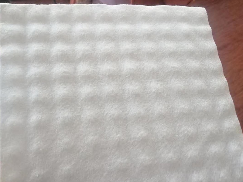 Plastic composite drainage board