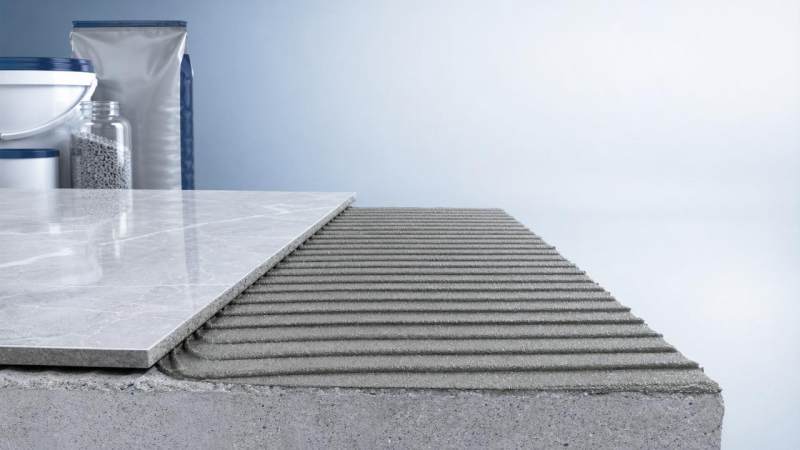 What improves bond strength in tile adhesive systems What improves bond strength in tile adhesive systems
