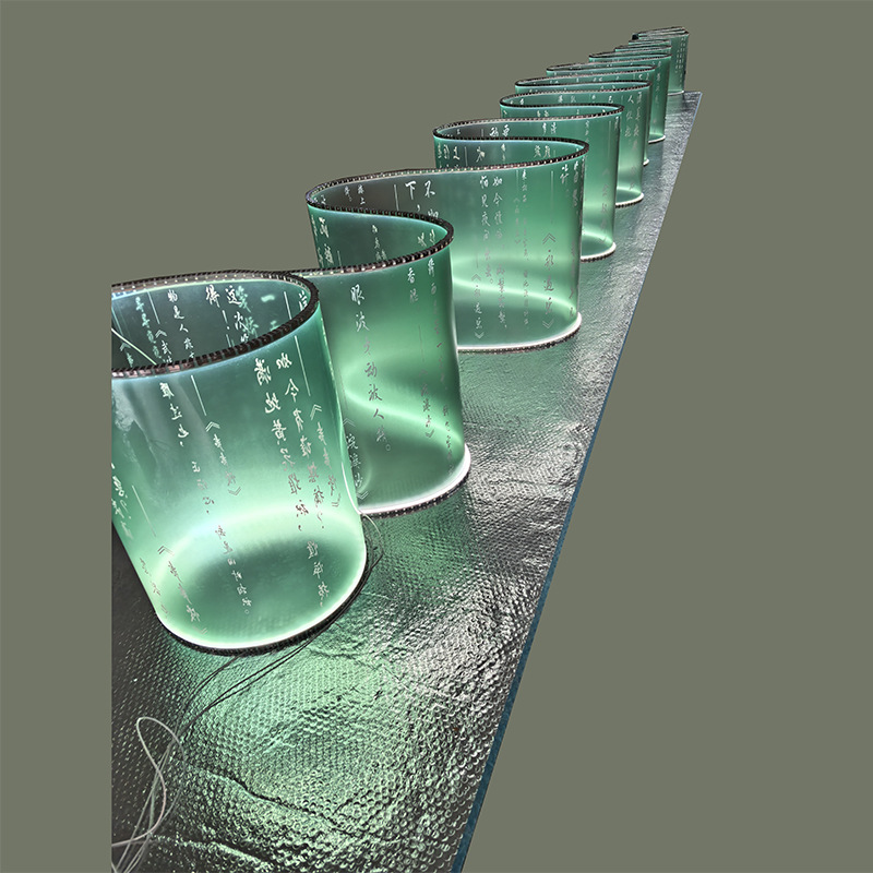 Semi opaque hollow calligraphy text ceiling banquet hall exhibition sales office design can be bent flexible pendant light ribbon