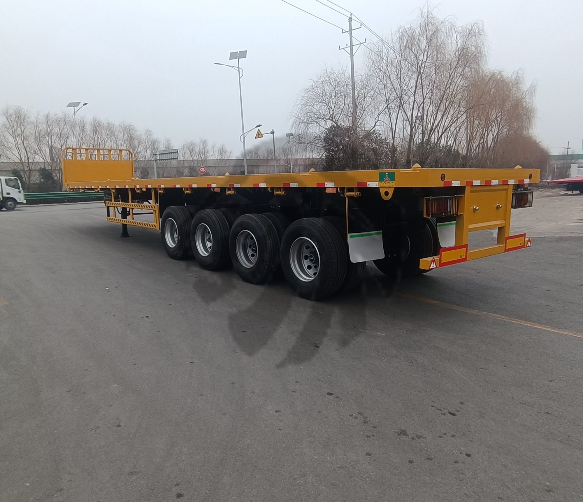 微信图片_20260716195307_235_451 70 Ton 4 Axle Flatbed Trailer