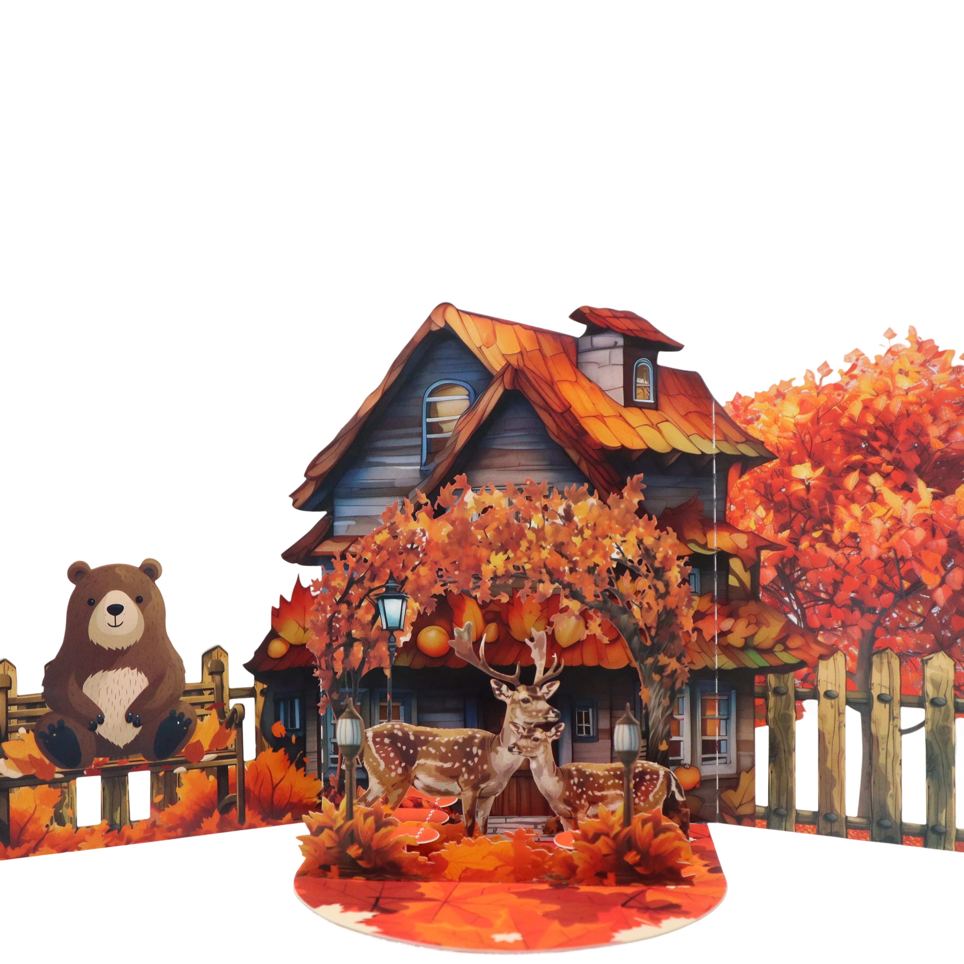 A greeting card featuring autumn maple leaves and a little deer