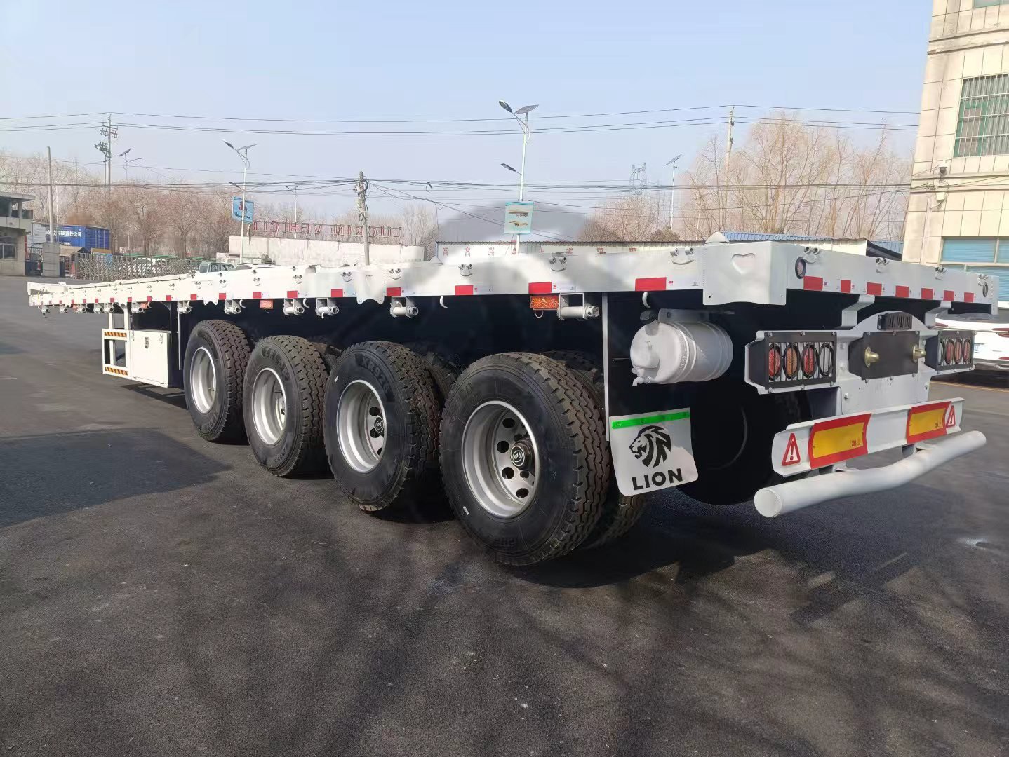 Remorque à plateau 70 tonnes à 4 essieux