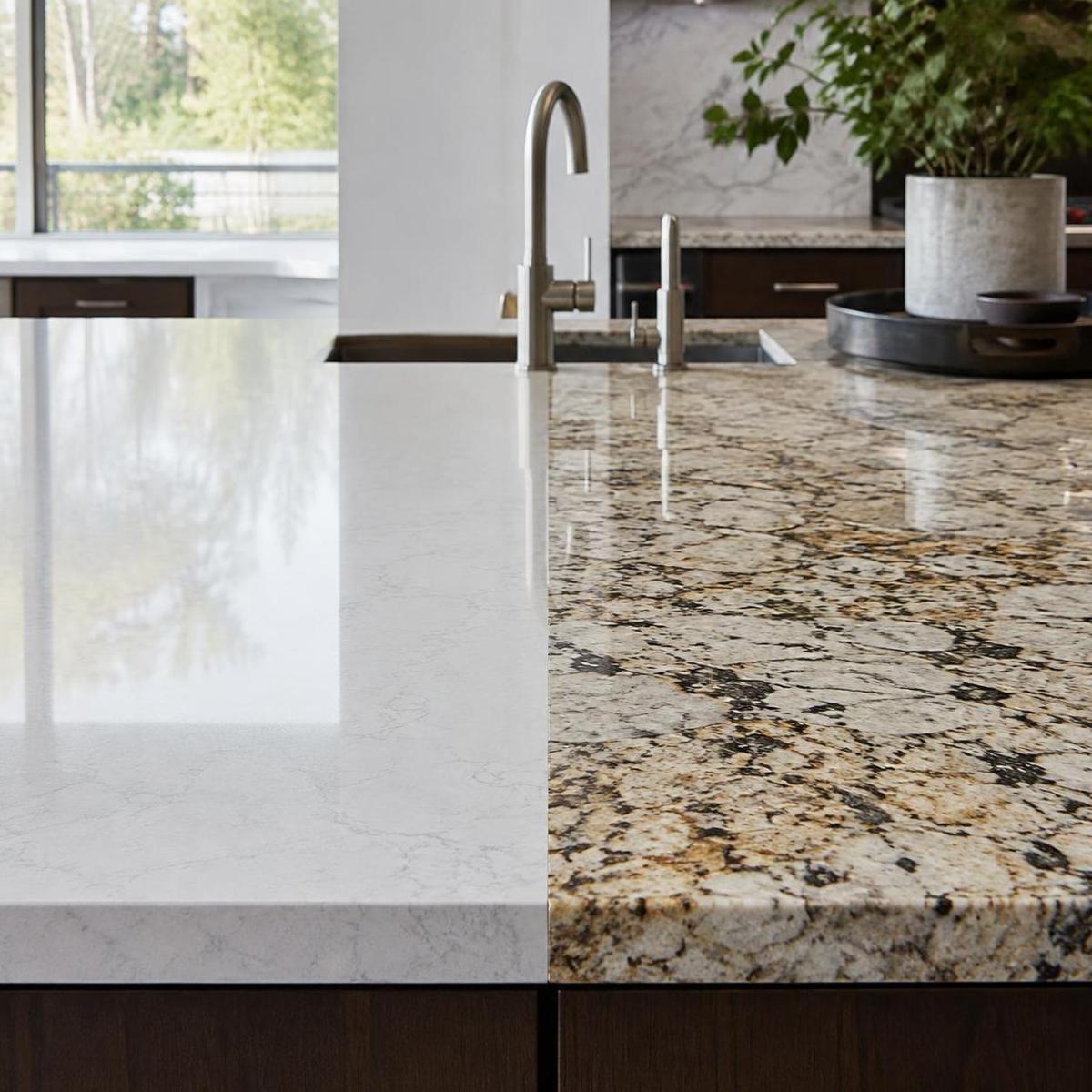 Quartz countertop edge next to a speckled granite countertop edge Quartz countertop edge next to a speckled granite countertop edge