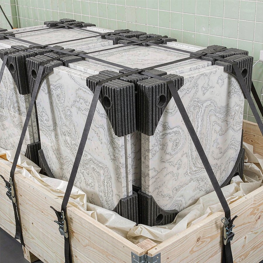 1789530982958696186097840128.jpg Quartz slabs being packed into export crates with corner guards and straps on the factory floor