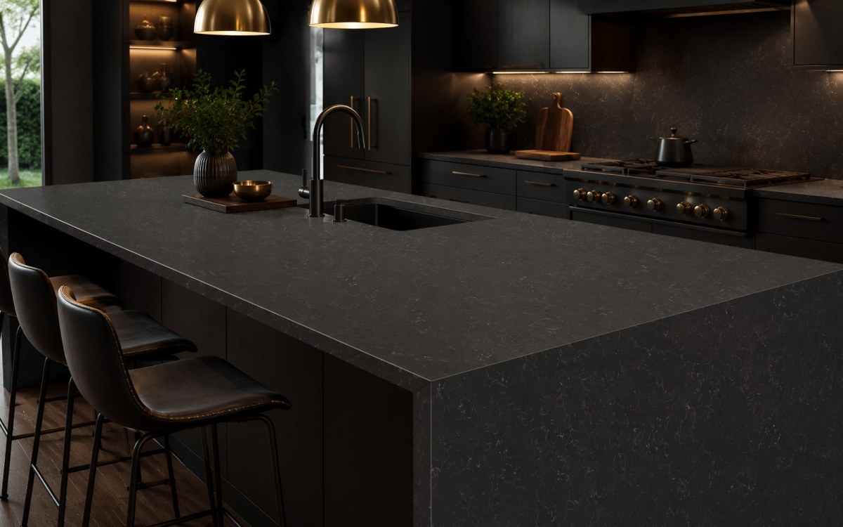 1792129795969596397837144064.jpg Dark quartz waterfall kitchen island with integrated undermount sink and mitred returns